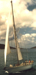 Firefly sailing in Gorda Sound, from port.